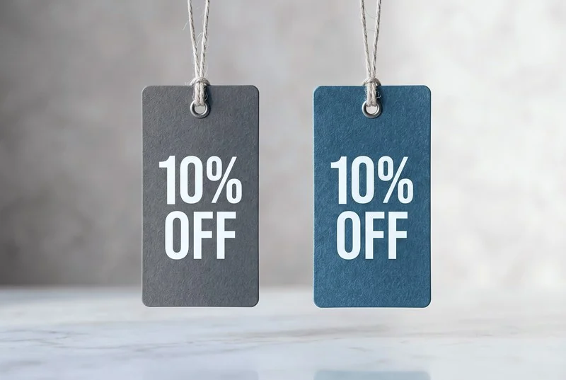 Gray and blue hanging sale tags both reading 10% off